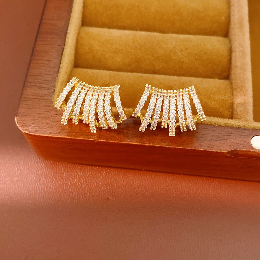 Gold Tone Curved Cubic Zirconia Earrings