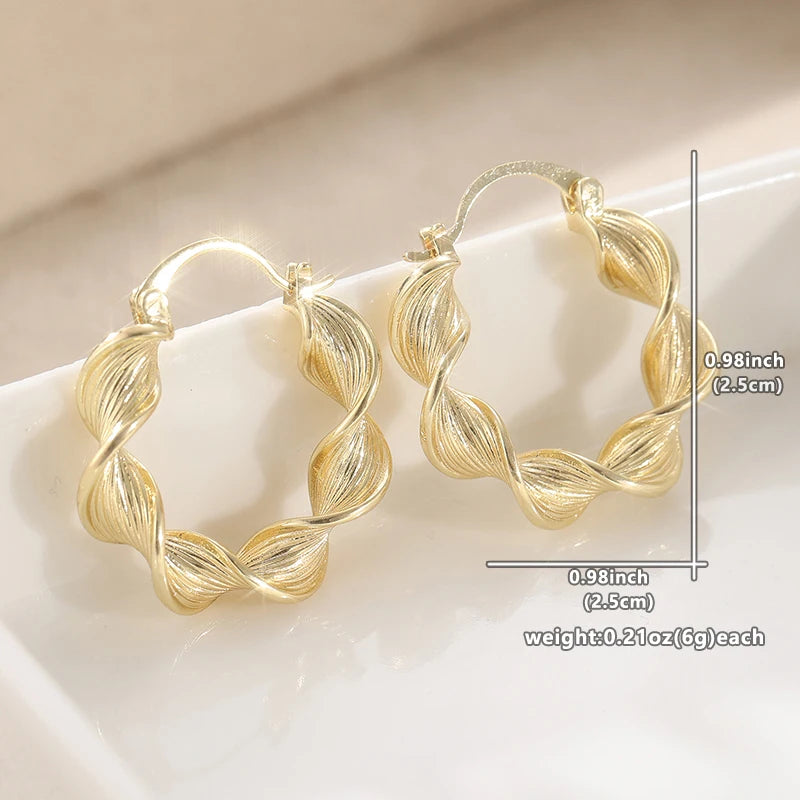 Carved Twisted Gold Tone Hoop Earrings