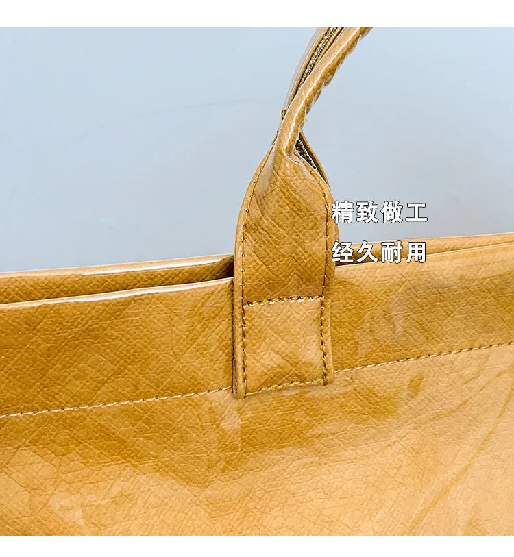 Kraft paper jelly waterproof bag, women's new retro commuting large capacity DuPont paper tote bag
