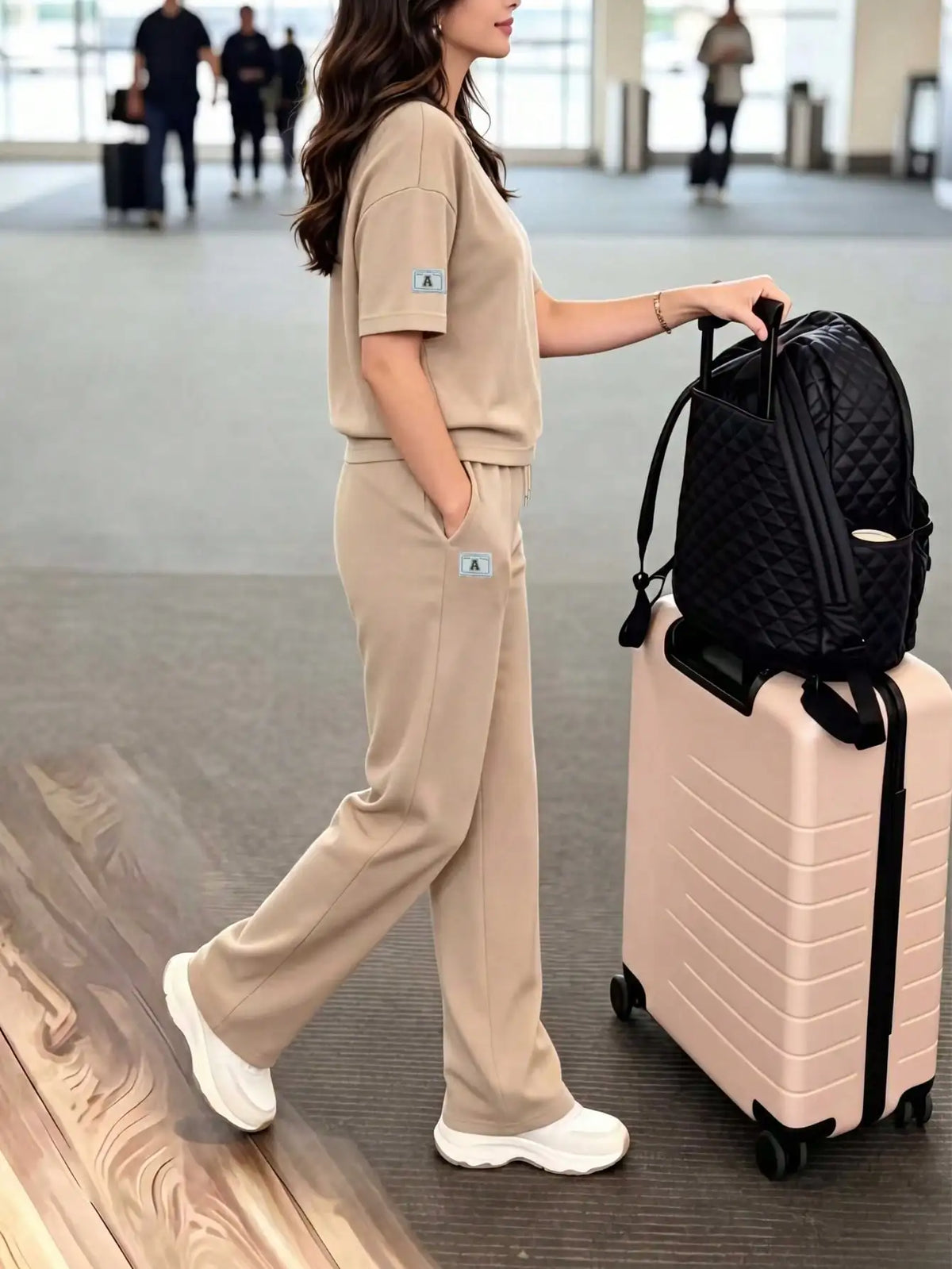 Women's casual two-piece set: crew neck T-shirt paired with long stretchy pants, comfortable loungewear set with pockets