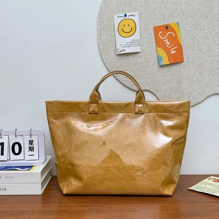 Kraft paper jelly waterproof bag, women's new retro commuting large capacity DuPont paper tote bag