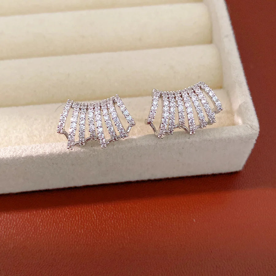 Gold Tone Curved Cubic Zirconia Earrings