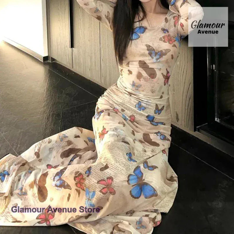 Korean retro spice wind butterfly print long-sleeved dress female summer new fashion sexy slim fold waist pocket hip dress