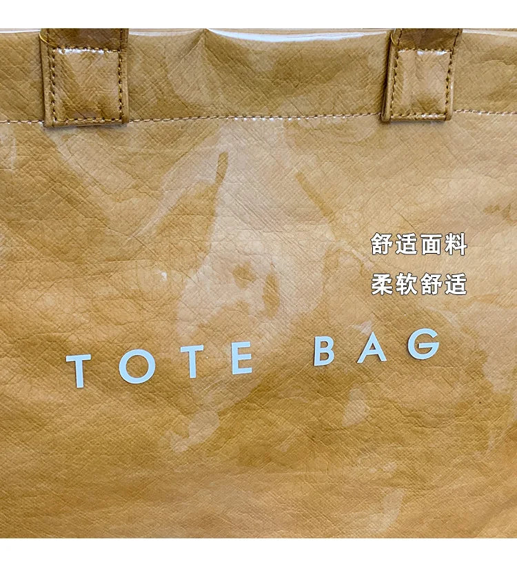 Kraft paper jelly waterproof bag, women's new retro commuting large capacity DuPont paper tote bag