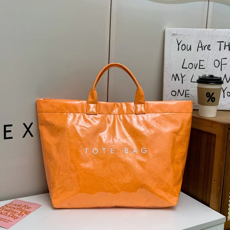 Kraft paper jelly waterproof bag, women's new retro commuting large capacity DuPont paper tote bag