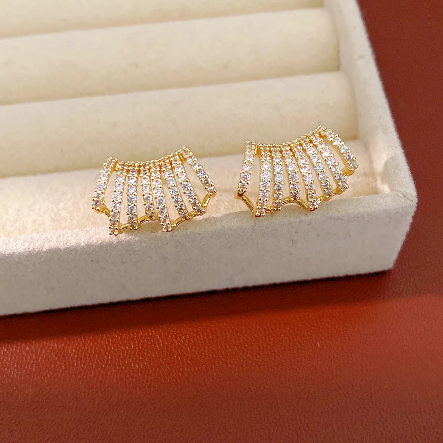 Gold Tone Curved Cubic Zirconia Earrings