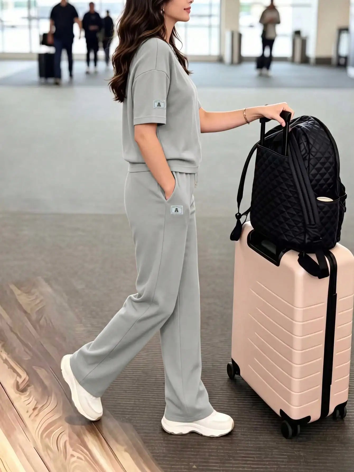Women's casual two-piece set: crew neck T-shirt paired with long stretchy pants, comfortable loungewear set with pockets