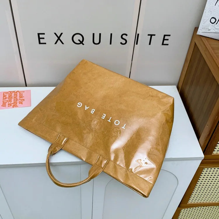 Kraft paper jelly waterproof bag, women's new retro commuting large capacity DuPont paper tote bag