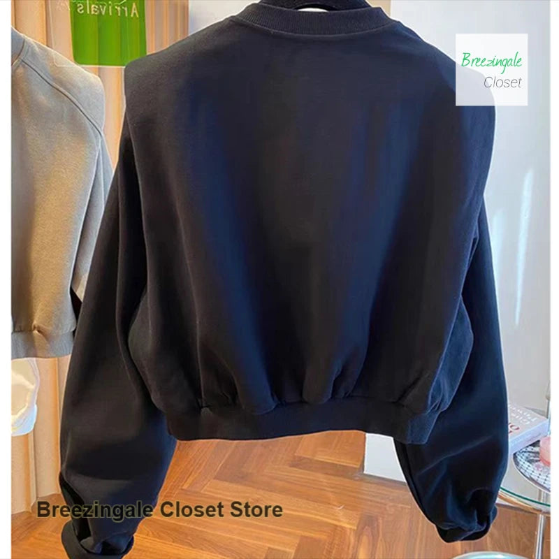 French style V-neck shoulder pads short sweater women's spring and autumn new fashion casual loose niche bottoming shirt