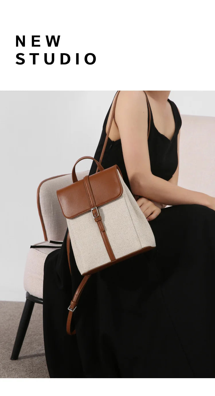 Summer new casual vacation style cowhide spelling linen shoulder bag French loose sense of backpack large capacity schoolbag