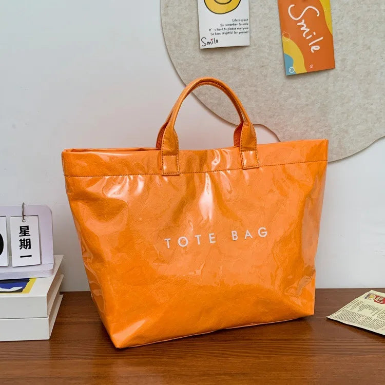 Kraft paper jelly waterproof bag, women's new retro commuting large capacity DuPont paper tote bag