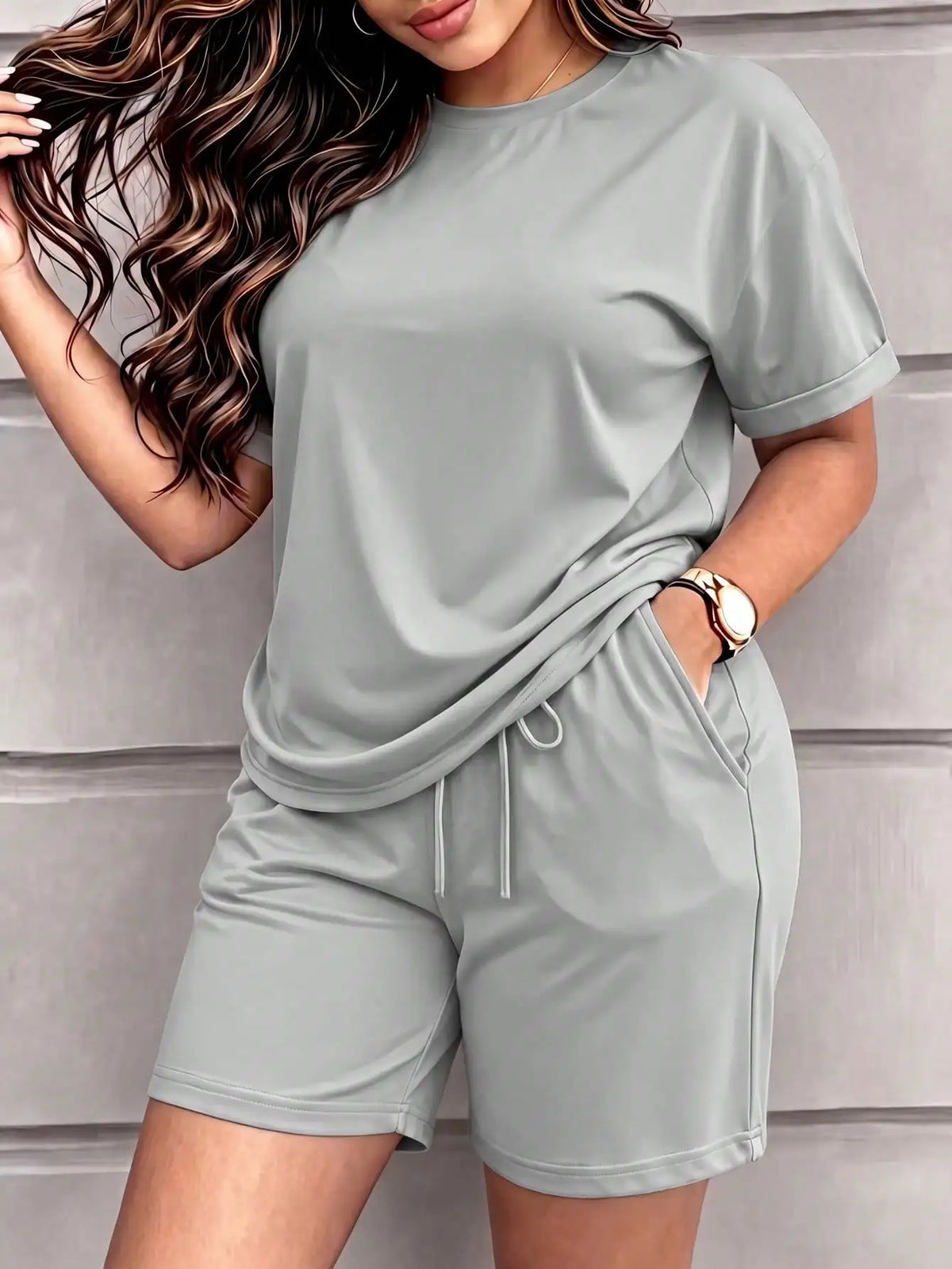 Spring and summer women’s clothing: Solid-color short-sleeved, retro round-neck T-shirts paired with elastic-waisted shorts. A simple, sporty and casual two-piece set.