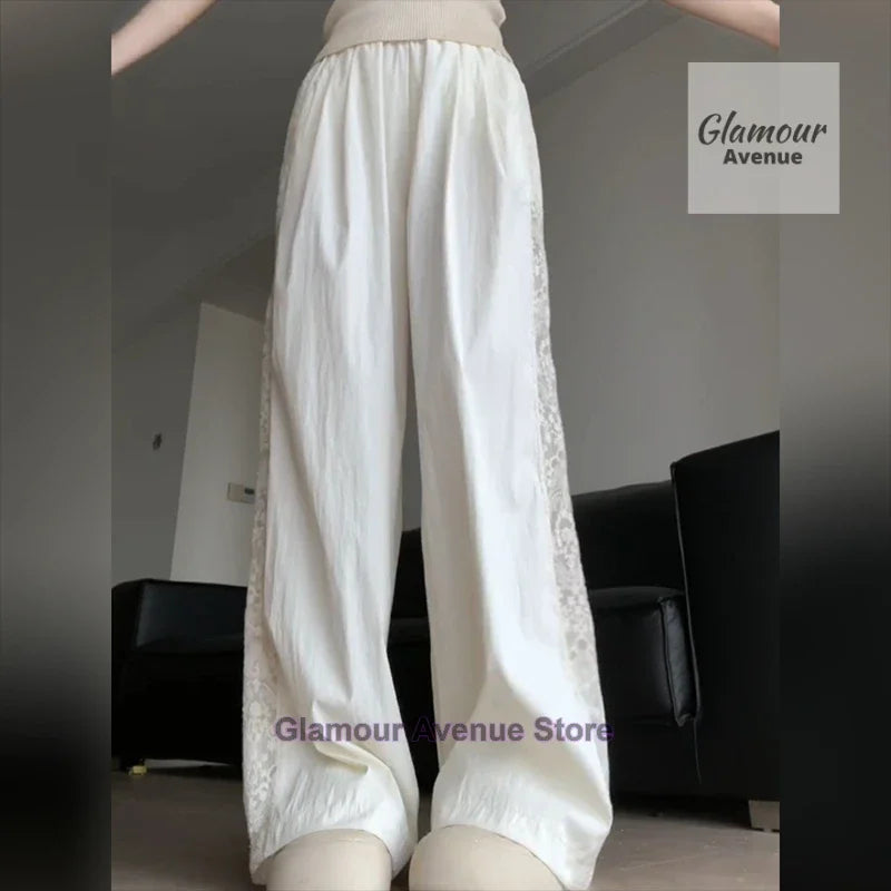 French retro lace design stitching pants women's summer new fashion temperament straight loose wide leg drop casual pants.