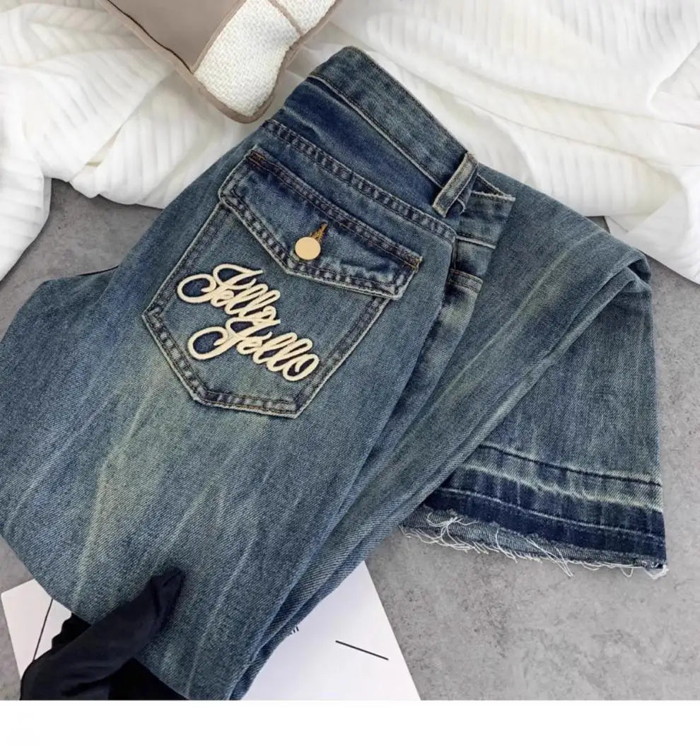 American retro low-waisted jeans female autumn new embroidery old casual fashion temperament slim Joker bell bottoms.
