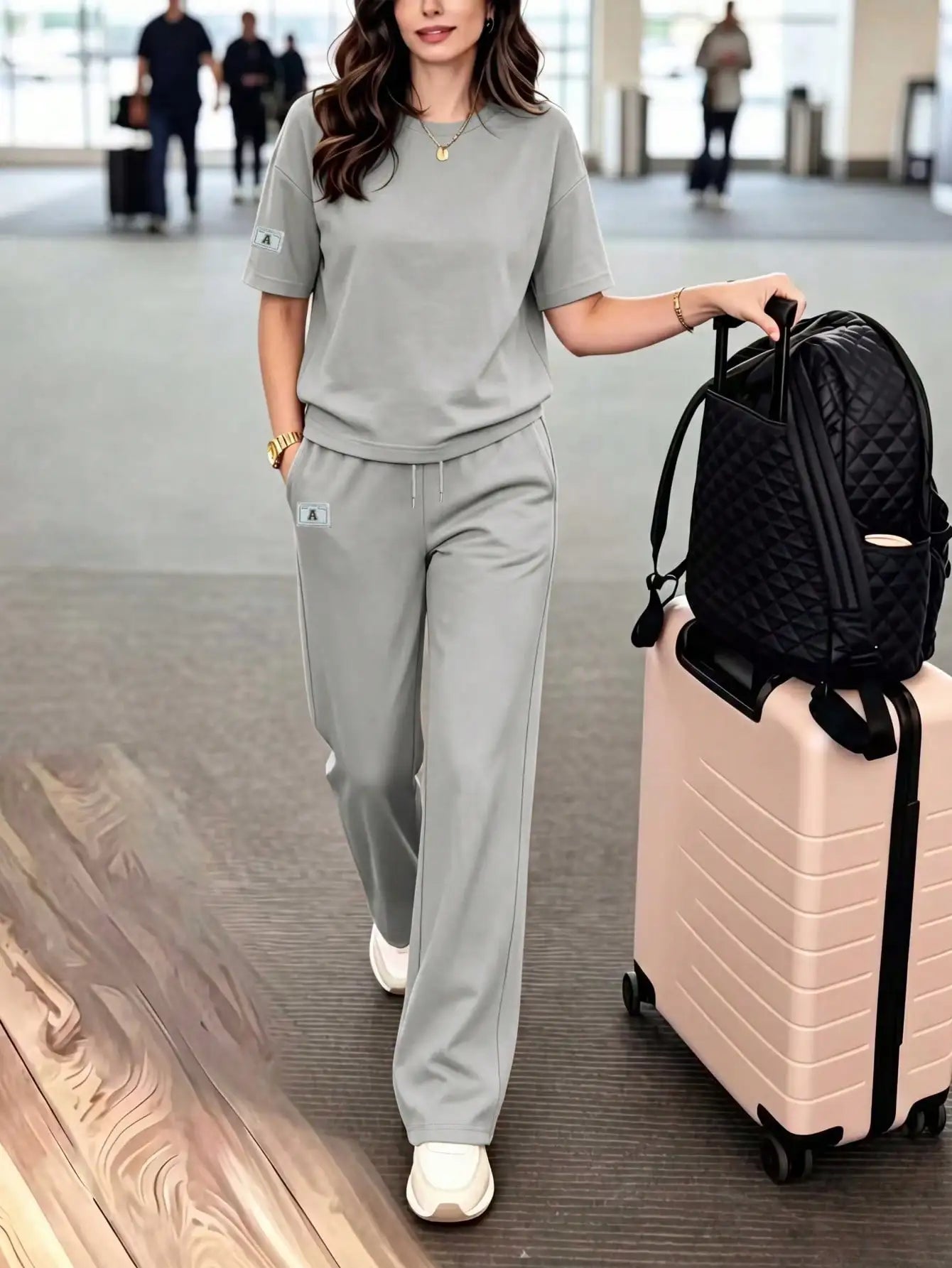 Women's casual two-piece set: crew neck T-shirt paired with long stretchy pants, comfortable loungewear set with pockets
