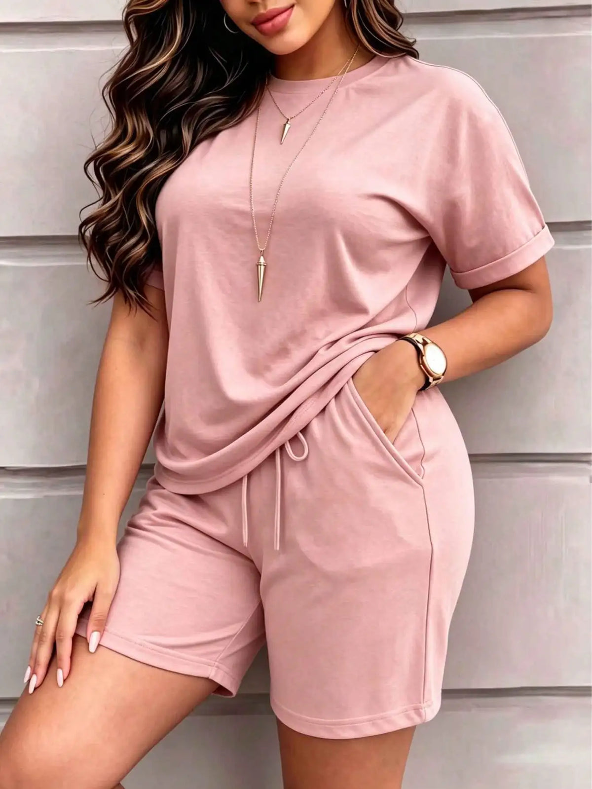 Spring and summer women’s clothing: Solid-color short-sleeved, retro round-neck T-shirts paired with elastic-waisted shorts. A simple, sporty and casual two-piece set.