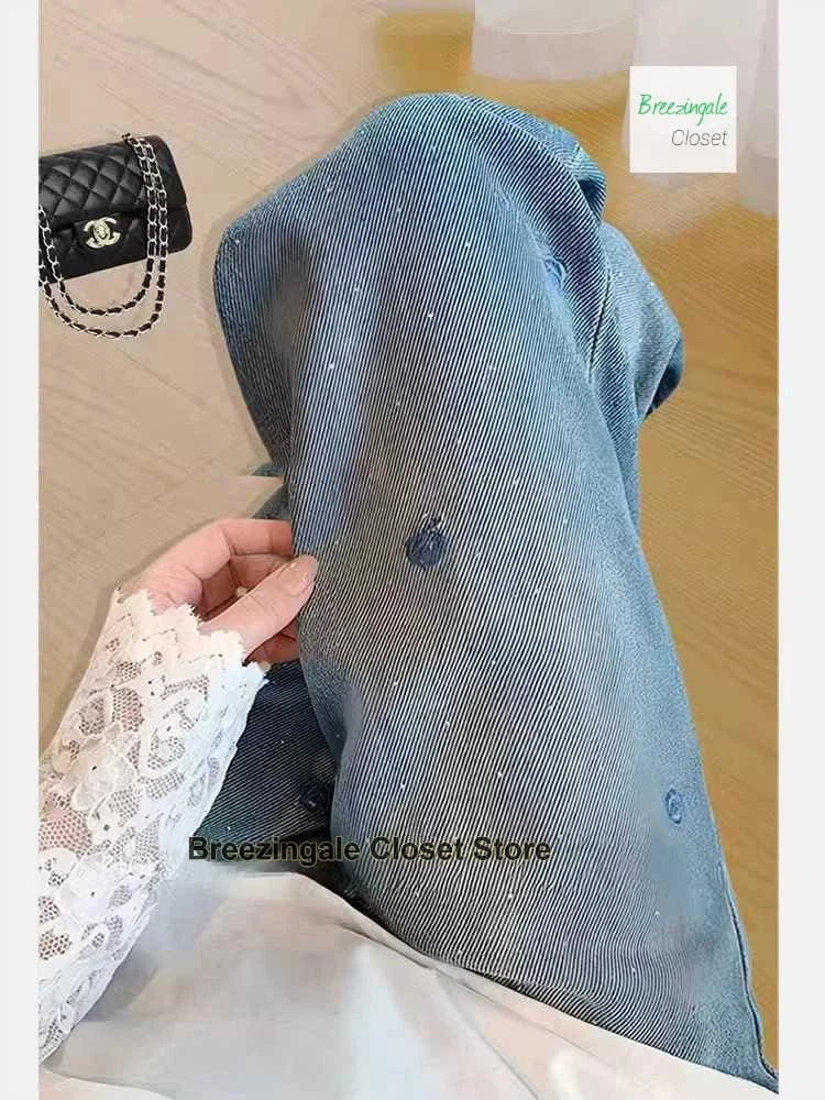 American retro blue embroidery rhinestone rose jeans women's summer new high waist heavy industry washed slim straight pants.