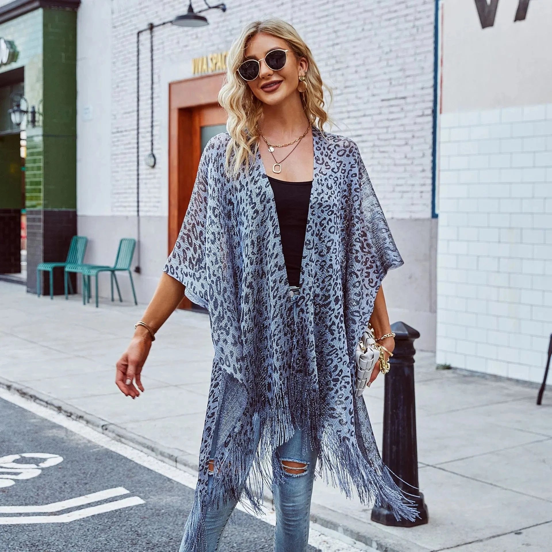 Dongguan Hong Xing Yue 2024 ladies travel summer new hollowed-out smock cape cover solid color leopard print smock cape tassel