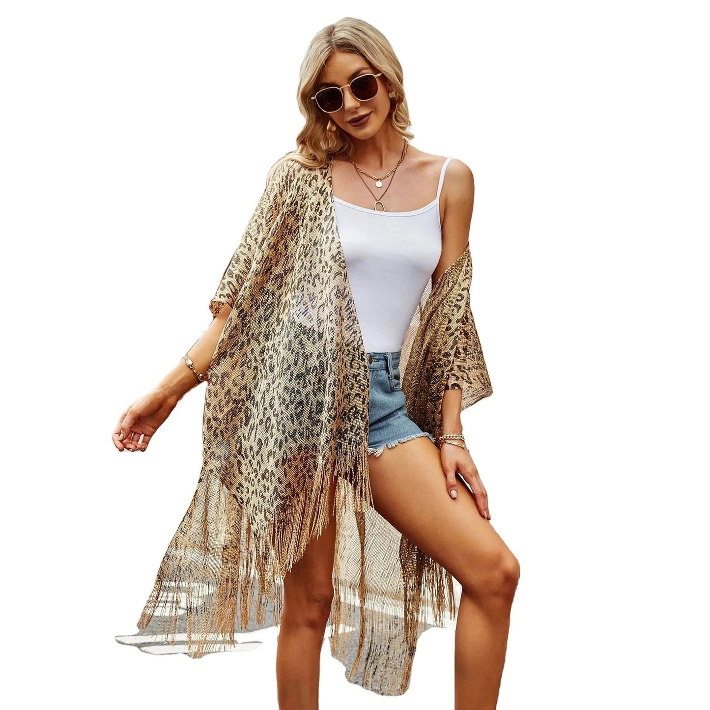 Dongguan Hong Xing Yue 2024 ladies travel summer new hollowed-out smock cape cover solid color leopard print smock cape tassel