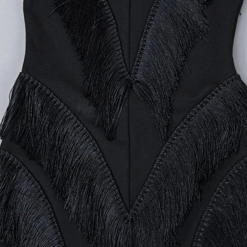 Female confident and generous black low-cut evening dress