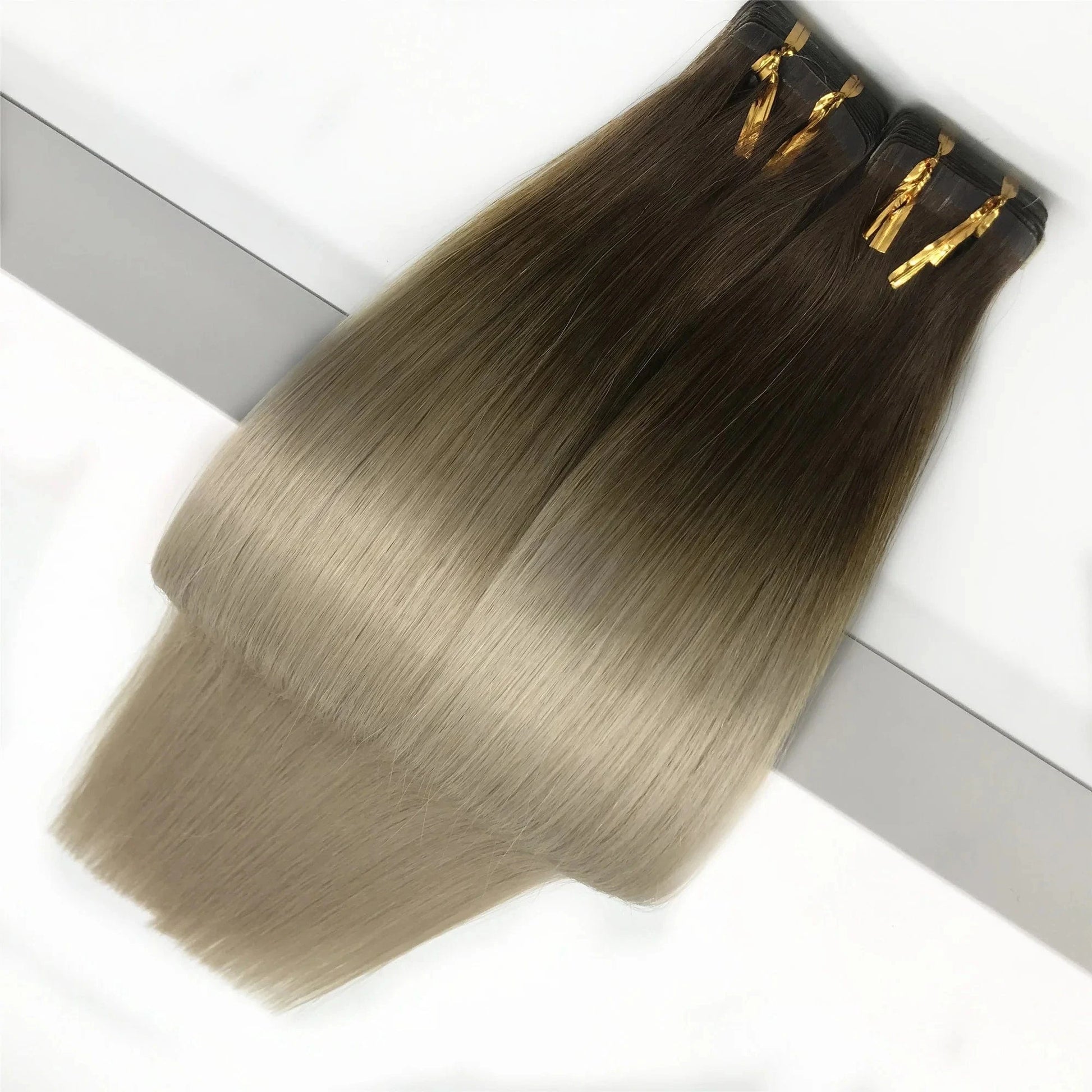 Hot sell invisible virgin remy russian/brazilian cuticle aligned invisible tape in human hair extension