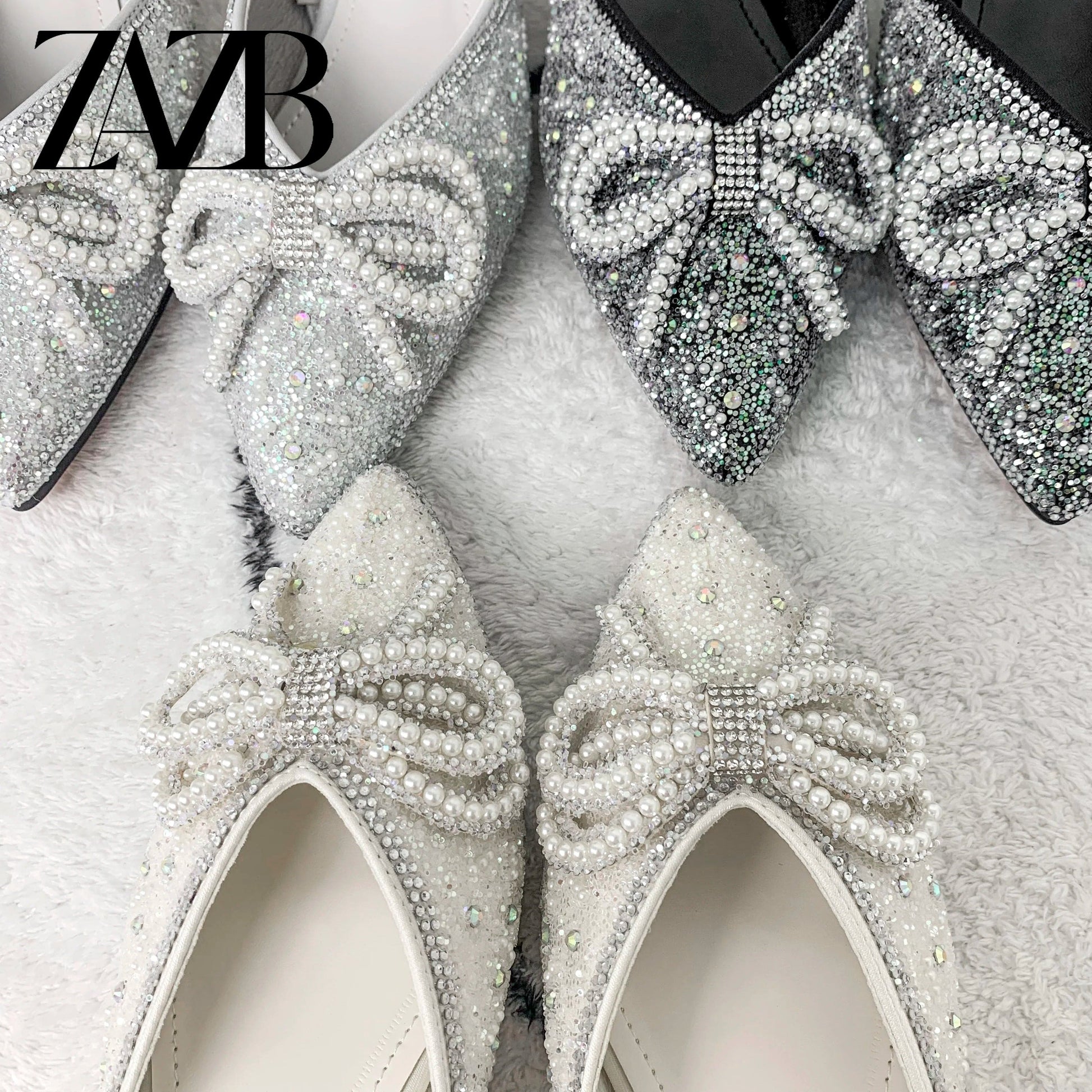 New summer wholesale bowknot Pointed head women's flat sandals Rome fashion One word band shoes Elegant office