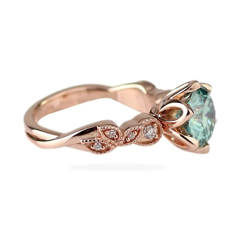 Stylish eternity 10k rose gold engagement ring with 1.5cts light blue round cut moissanite diamond