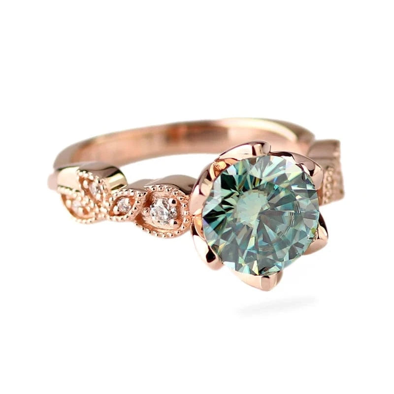 Stylish eternity 10k rose gold engagement ring with 1.5cts light blue round cut moissanite diamond