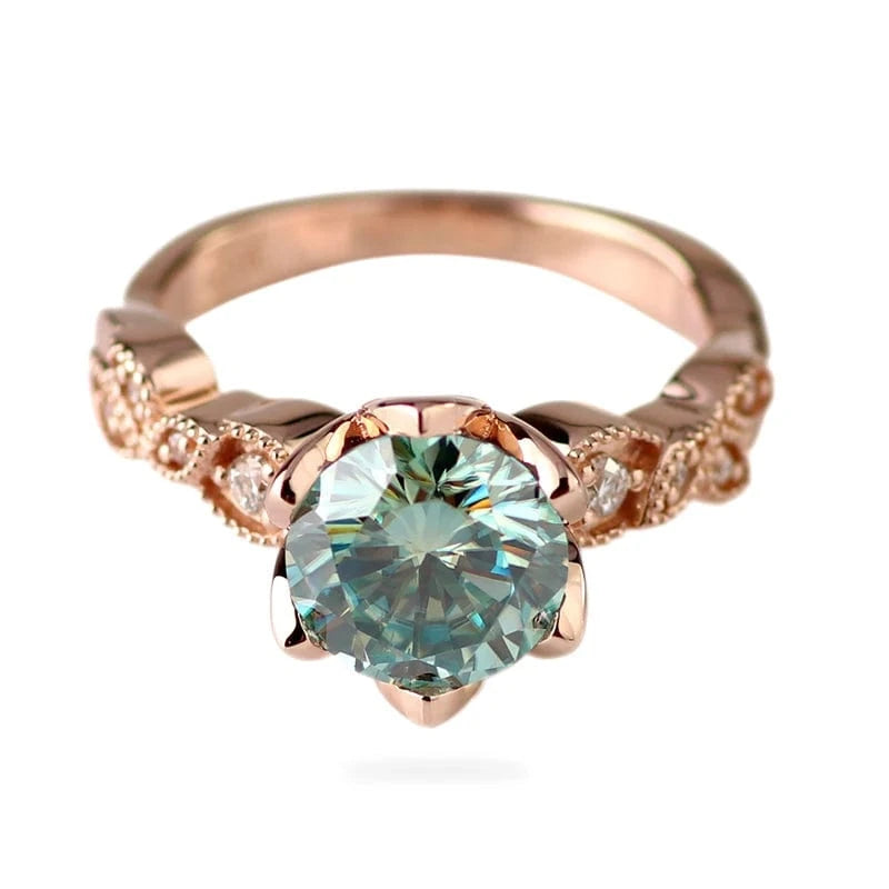 Stylish eternity 10k rose gold engagement ring with 1.5cts light blue round cut moissanite diamond