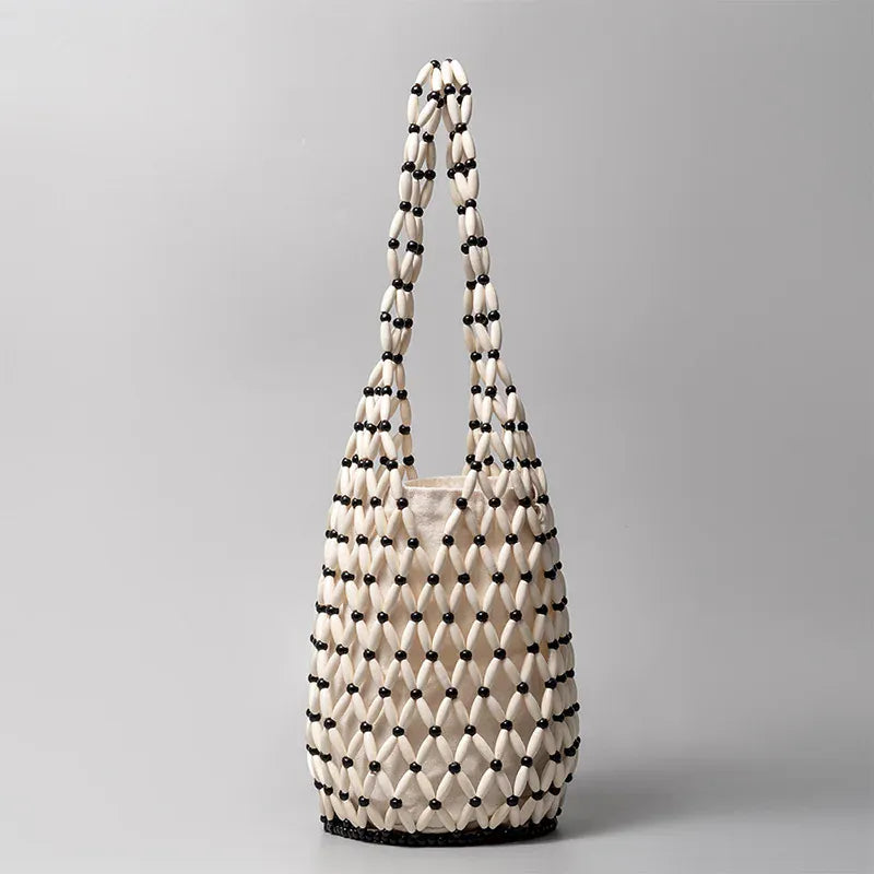 White Black Bead Hollow wood bead straw bag lady fashion brand texture drawstring design shoulder bag simple versatile cylindrical crossbody bag