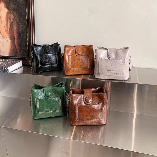 Wholesale New Fashion Bucket handbags 2024 Light Lady Wide Shoulder Strip Bags Lady Design Purses For Women