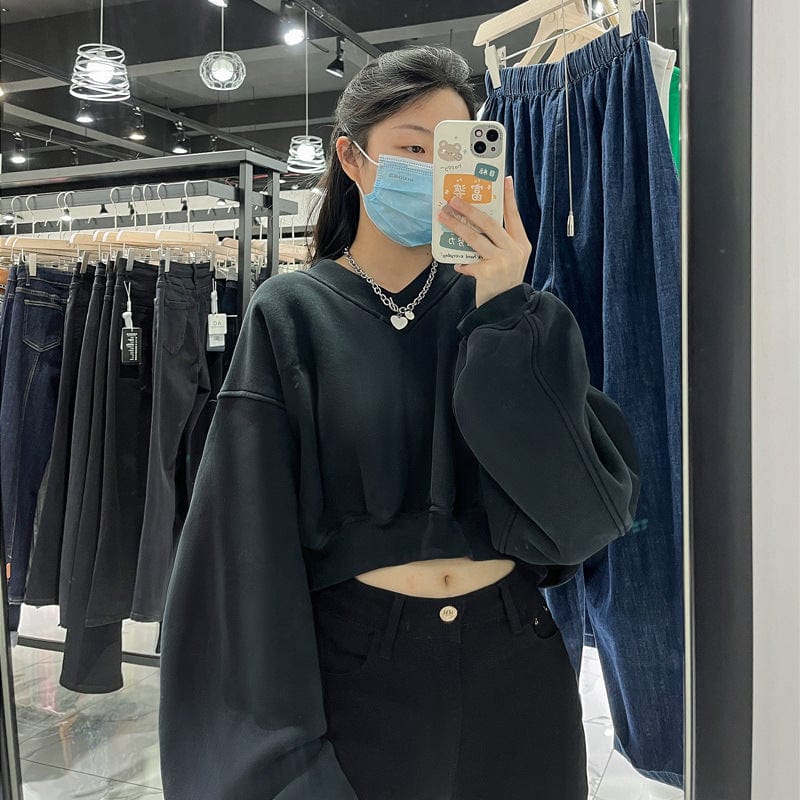 Black sweater women's thin loose loose 2023 spring and autumn all-match high-waisted navel-exposed short long-sleeved top