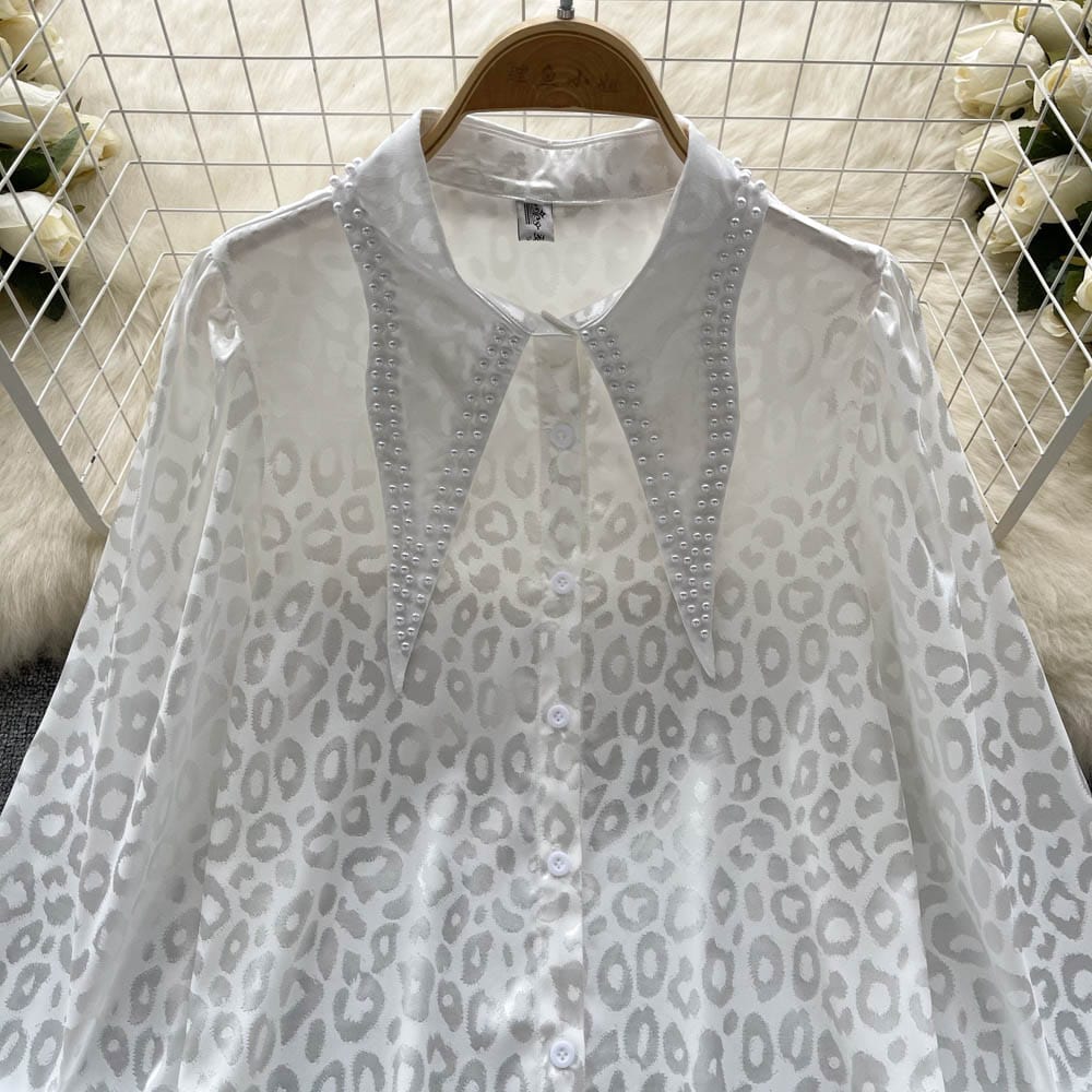 Ins-style fashionable personality print shirt women's long-sleeved spring new point-neck chic French top