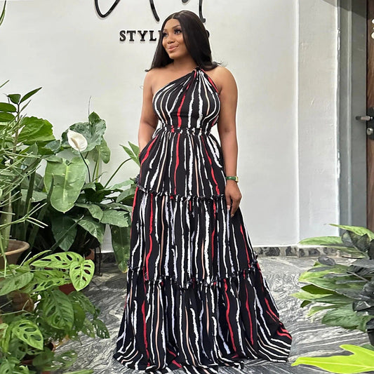 J&H Summer 2024 Sexy Printed Patchwork Strap Large Skirt Hem Slanted Shoulder Backless Bohemian Maxi Dress