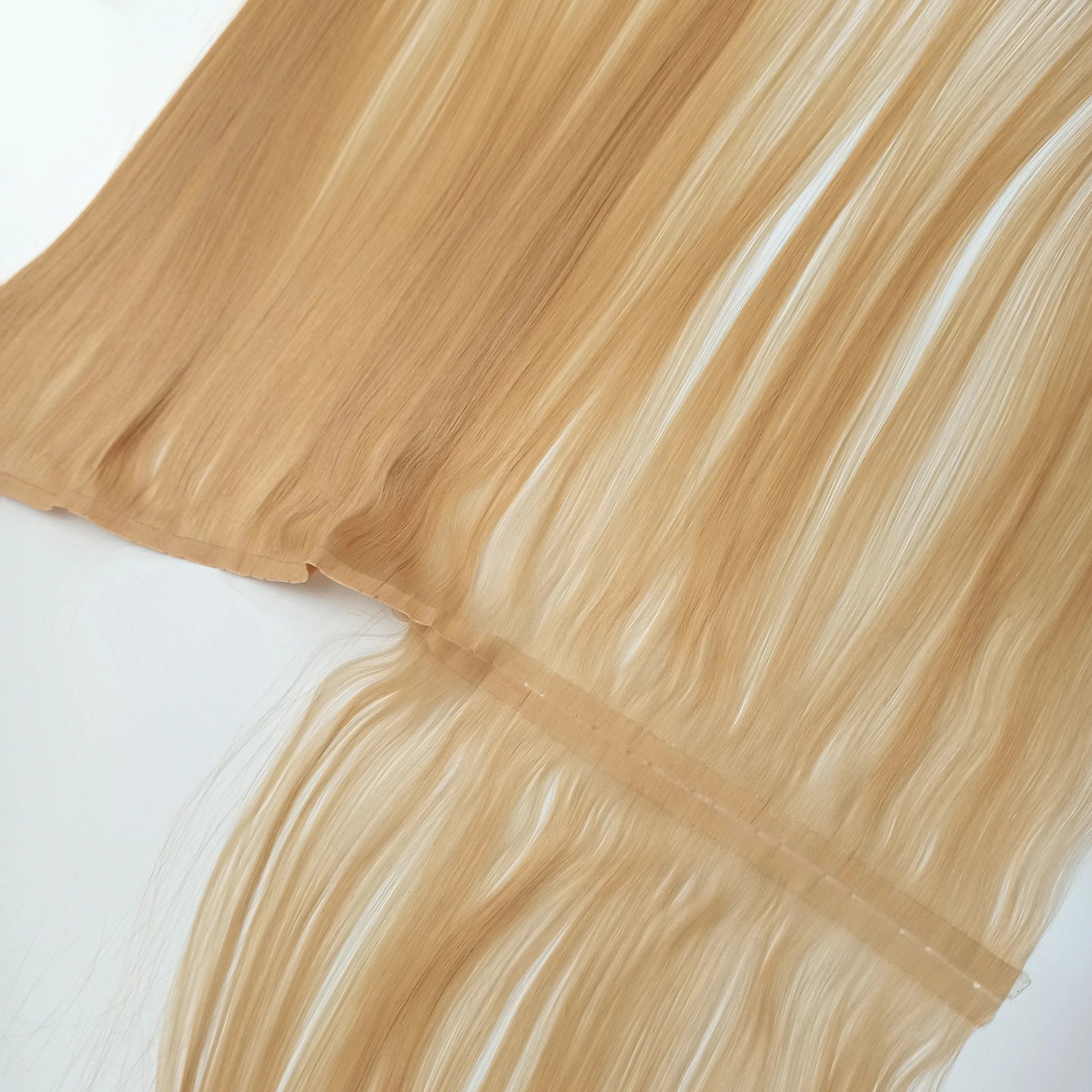 Physical tape hair Best selling wholesale price Silky Straight Raw Remy human invisible seamlesss tape in hair extensions