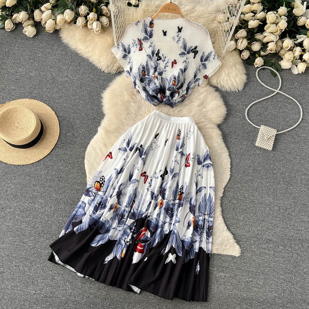 Spring and summer fashion printing suit women's hook flower loose short sleeve top and high waist pleated skirt two-piece set