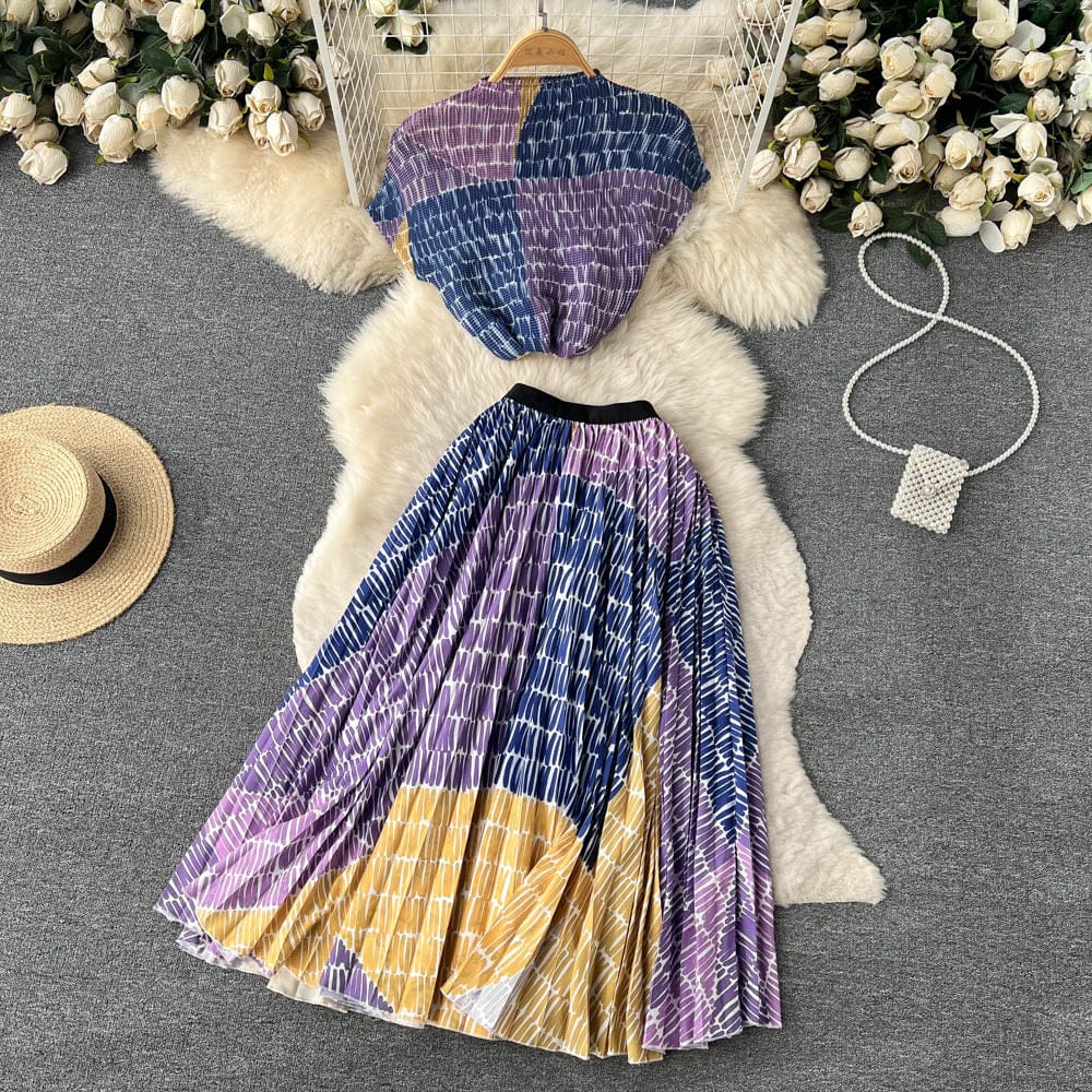 Spring and summer fashion printing suit women's hook flower loose short sleeve top and high waist pleated skirt two-piece set