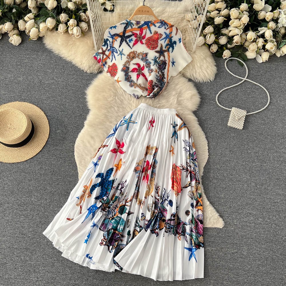 Spring and summer fashion printing suit women's hook flower loose short sleeve top and high waist pleated skirt two-piece set