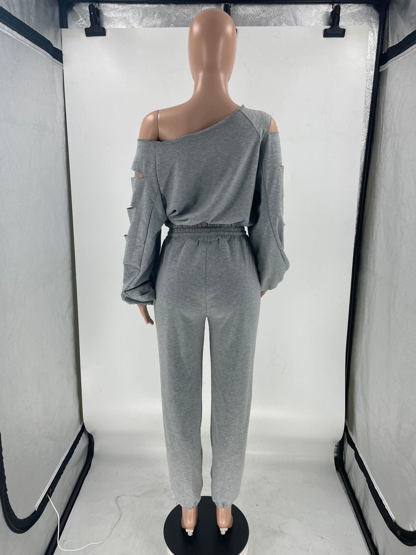 Women's fashion solid color hollow loose casual sloping shoulder sweater two-piece set