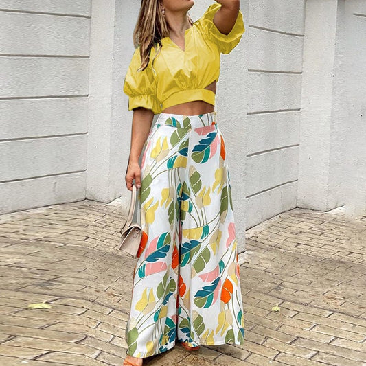 YS Women's new temperament V-neck hollow-out jacket printed wide-leg trousers two women clothing sets